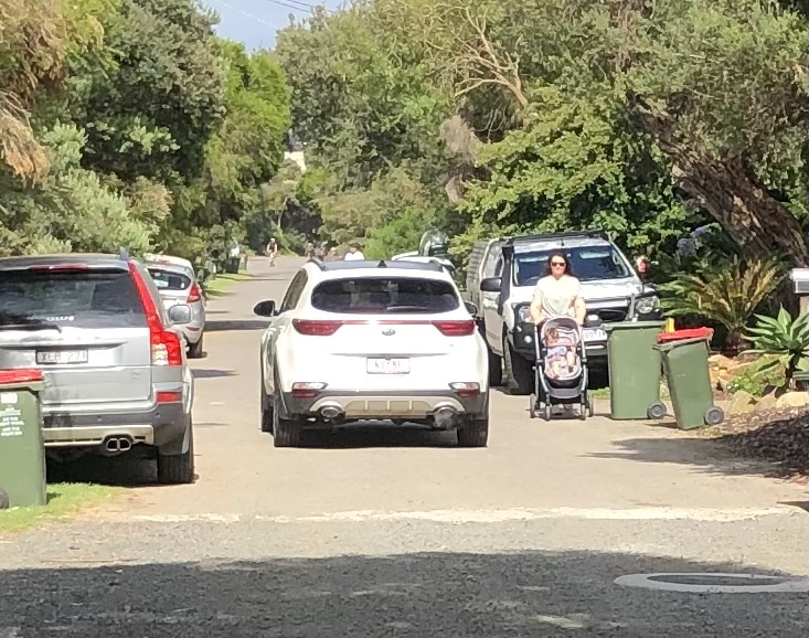 Pedestrians using road on Lohr Avenue